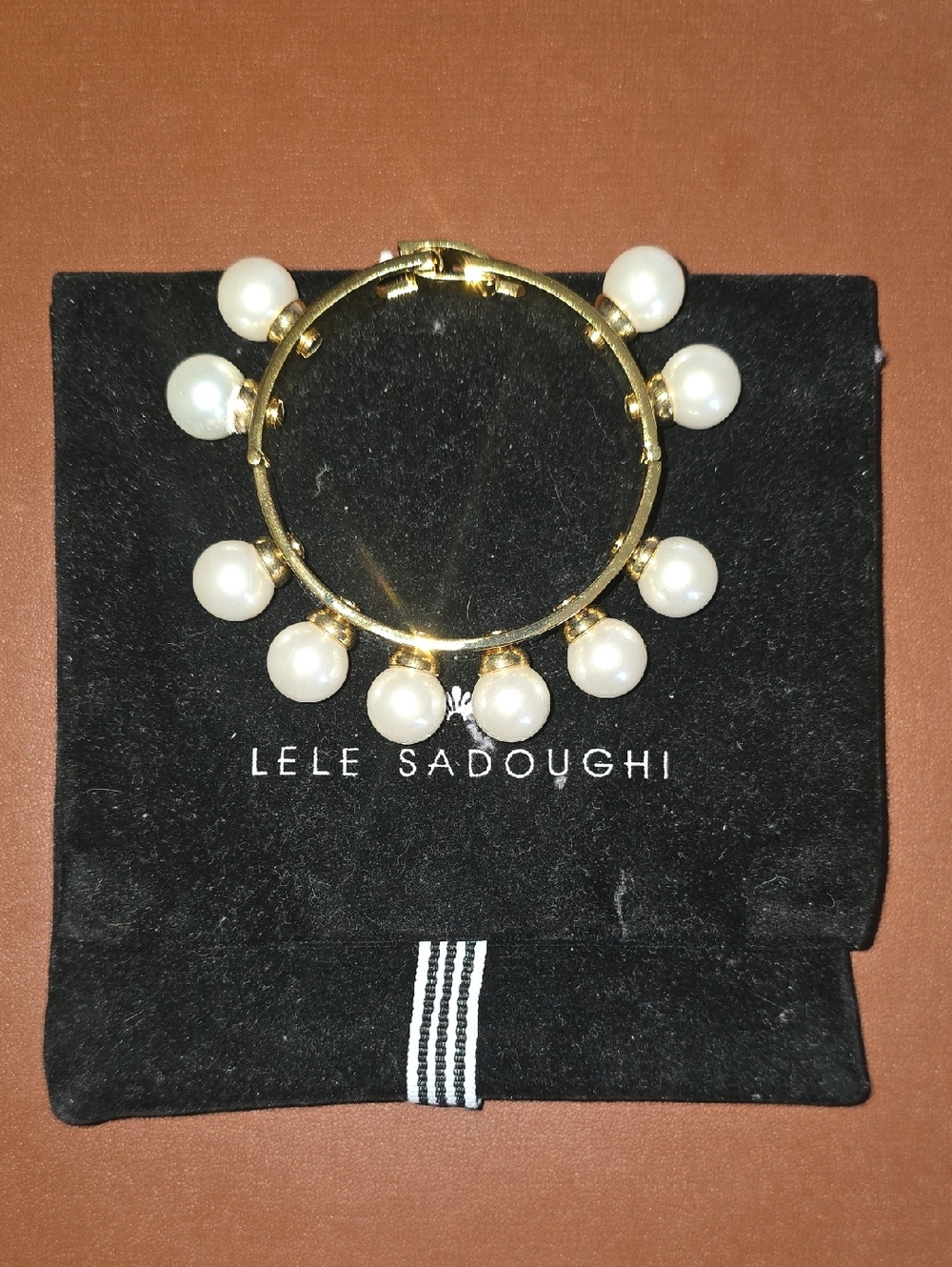 Lele Sadoughi Gold Bangle Bracelet with Clasp Closure White Pearl Charms